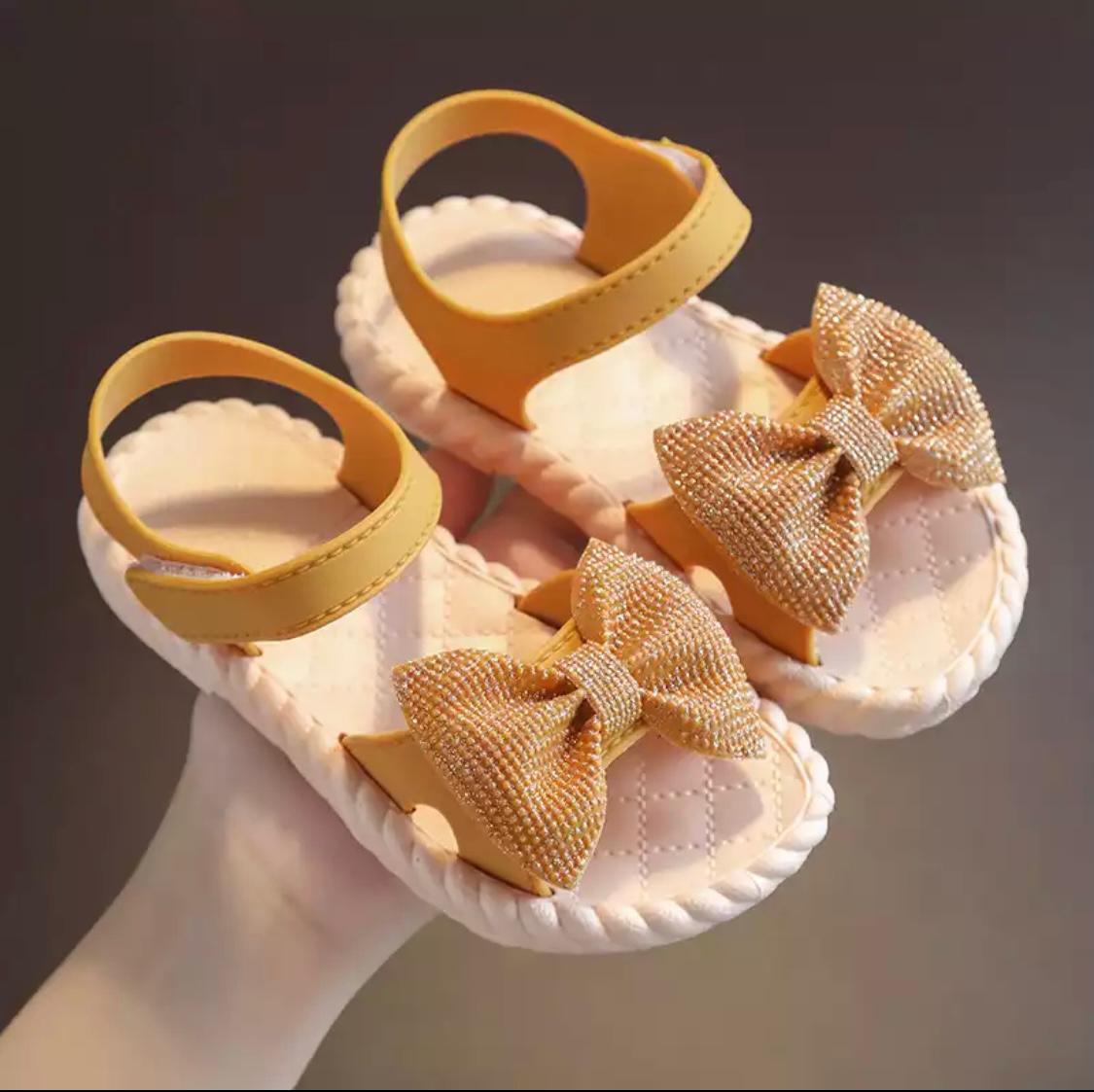 Gold bow sandals